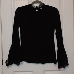 Black top with lace sleeves